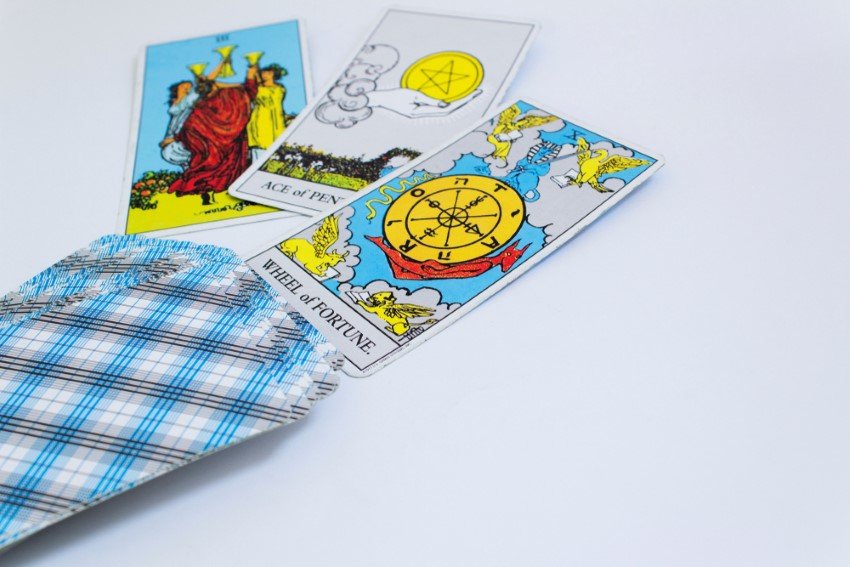 Rider Waite Tarot Deck Left And 3 Flipped Cards Three Of Cups On The Left Ace Of Pentacles In The Center And Wheel Of Fortune On The Right